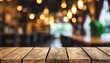 empty wooden tabletop with blurred bar background