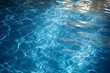 Alive with vibrant caustics as sunlight filters through the rippling waves on the water's surface of a swimming pool