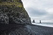 Famous basalt rocks at reynisfjara beach, black sand beach in iceland
