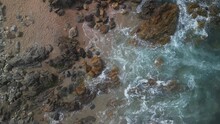 Drone Shot Of The Atlantic Ocean Waves Crashing On Rocks On Matosinhos Beach In Porto City, Portugal