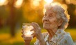Old elderly woman enjoying a glass of water to hydrate herself with fresh air of a park on summer heatwave, Generative AI
