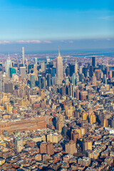 Wall Mural - New York City skyline and Hudson River as seen from Helicopter at sunset, One World Trade Center view. Aerial view of Manhattan, Battery Park, freedom tower, Downtown, Finance center