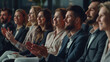 © S photographer - Selective focus of A group of businessmen clapping in a seminar room.