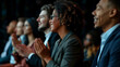 © S photographer - Selective focus of A group of businessmen clapping in a seminar room.