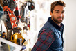 © ArcursJointTeam/peopleimages.com - Tools, carpenter and portrait of man in garage for manufacturing, production or small business. Male person, equipment and handyman with smile for renovation, maintenance or remodeling in workshop