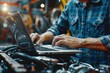 © Igor - Anmechanical technician using laptop computer programming. Car maintenance service concept
