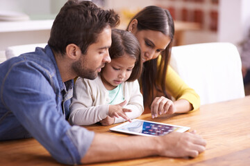 Wall Mural - Mom, dad and child at table with tablet for teaching, learning and support in education with love. Elearning, digital app and parents with girl for help in homeschool, growth and development online