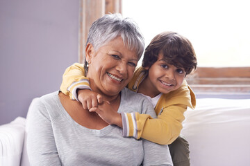 Wall Mural - Smile, sofa and portrait of grandmother with kid for love, support and childhood development at home Relax, elderly woman and boy with happiness for weekend, care and bonding together in living room