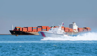 Wall Mural - Coast Guard patrol boat rushing to the rescue