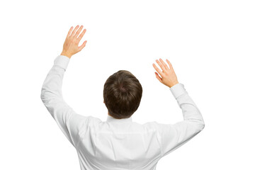 Wall Mural - A man in a white shirt making a pushing gesture with both hands, isolated on a white background, concept of interaction with a virtual interface or screen