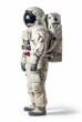 An astronaut geared up in a full space suit standing against a white backdrop, exuding the essence of space exploration.