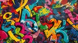 Fototapeta  - This is an image of a graffiti-covered wall. The graffiti is colorful and abstract, and it appears to have been created by multiple artists.