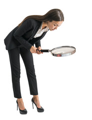 Sticker - A professional businesswoman is intensely looking through a magnifying glass, isolated on a white background, representing the concept of search and analysis