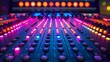 Media mixer console illuminated with colorful LEDs