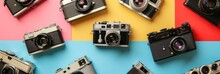 A Collection Of Vintage Cameras On A Colorful Background, Ideal For A Photography-themed Retro Banner