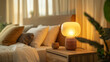A cozy bedroom with a glowing table lamp