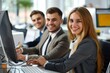 © k-PHOTO - Group of business people and software developers working as a team in office