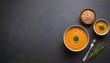 Red lentil soup puree on stone table