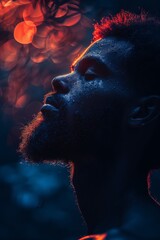 Wall Mural - Close-up African American young man with closed eyes portrait in profile