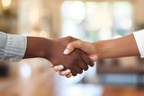 Fototapeta  - Two multiracial business people shaking hands indoors