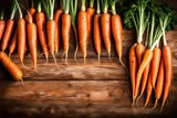 Fototapeta  - carrots on a wooden background