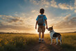 Abenteuer in der Dämmerung: Junge und sein Hund auf dem Feldweg im Sonnenuntergang