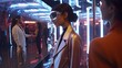© Yauhen - Exploring Meta Universe. Friends Try Futuristic Outfits. Friends immerse in a surreal experience, trying on futuristic attire in a store where each mirror unveils a new dimension of style