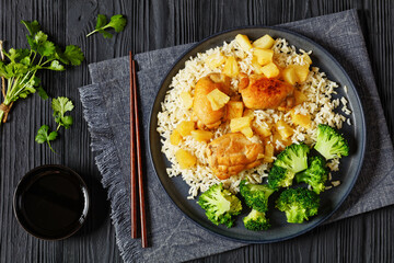 Wall Mural - chicken thighs with pineapple, rice and broccoli