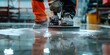 Surface Preparation for Epoxy Floors in Factories Using High-Speed Polisher. Concept Surface Preparation, Epoxy Floors, Factories, High-Speed Polisher, Cleaning