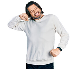 Poster - Middle age caucasian man wearing casual clothes stretching back, tired and relaxed, sleepy and yawning for early morning