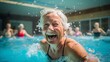 Active laughing senior women have fun in swimming pool. Happy mature concept. Grandmother doing aqua aerobic. Elderly healthy female smiling in water