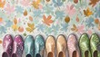 A semiabstract background with a row of multicolored pastel rubber shoes, autumn leaves, flowers, bokeh effect