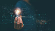 © krungchingpixs - Businessman holding lightbulb and use ai by enter command prompt and chat for generates something..The concept of using artificial intelligence to generate ideas for innovation and inspiration.