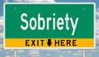 © Rex Wholster - Green and yellow highway sign with exit arrow for SOBRIETY