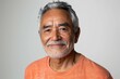 © top images - A man with a white beard and gray hair is smiling for the camera