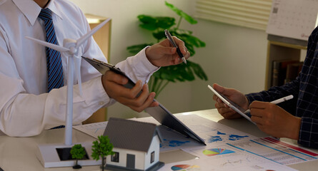 Business Signing a Contract Buy - sell house, insurance agent analyzing about home investment loan Real Estate concept.