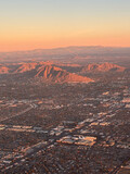 Fototapeta Zwierzęta - flying over Phoenix, Arizona at dawn