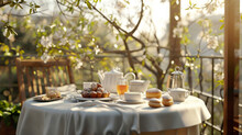 Outdoor Breakfast Setting On A Terrace Adorned With Spring Blossoms, Featuring A Teapot, Fresh Juice, And Pastries, Bathed In The Gentle Morning Sunlight