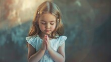 Cute Little Girl Praying With Folded Hands And Closed Eyes - Studio Portrait With Copyspace