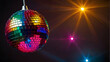 Shiny colorful disco ball with lights, with copy space