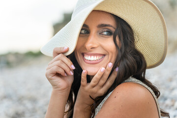 Portrait of a beautiful young girl with hat