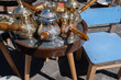 A few ornamented turkish coffee turk or cezve displayed at flea market