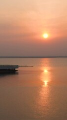 Wall Mural - Sunset at the lake in the evening