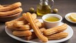 Several fried churros with olive oil typical of Spain