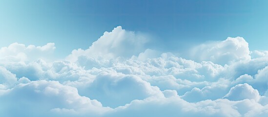 Wall Mural - The image shows a vast sky full of fluffy white clouds drifting peacefully overhead