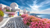 Fototapeta Na drzwi - Santorini, Greece. Picturesq view of traditional cycladic Santorini houses on small street with flowers in foreground. Location Oia village, Santorini, Greece