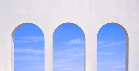 Wall Mural - Row of 3 white Tuscany arch wall of modern coffee shop against clouds on blue sky background in minimal style, exterior architecture backdrop design 