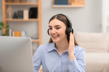 Poster - E-learning. Young woman studying with computer during online lesson indoors.