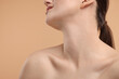 © New Africa - Beauty concept. Woman on beige background, closeup