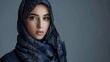 A stunning female Muslim model is shown in a close-up wearing a stylish 